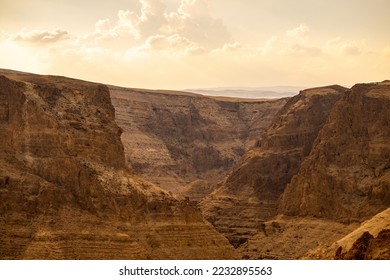 A view of Darga river cliffs in the judea desert in Israel. - Shutterstock ID 2232895563