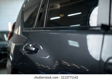 A View Of Dark Gray Car Rear Door And Window