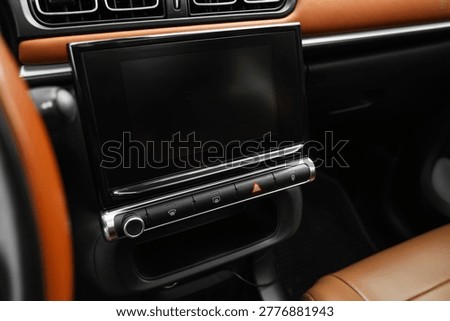 View of dashboard with touchscreen display in modern car, closeup