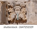 View to decorative maskeron of Big Onofrio