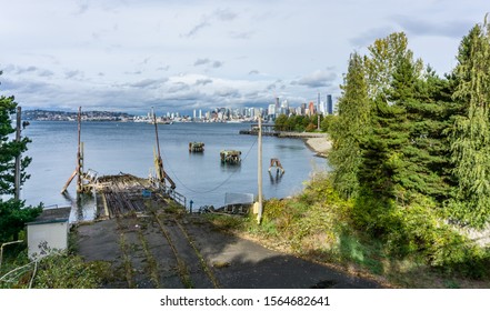 A View Of A Derelict Wharf And The Seattle Skyline.