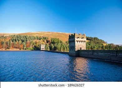 View of Derwent Dam and Reservoir, Peak District National Park, Derbyshire, UK. Derwent Reservoir is the middle of three reservoirs in the Upper Derwent Valley in the north-east of Derbyshire, England