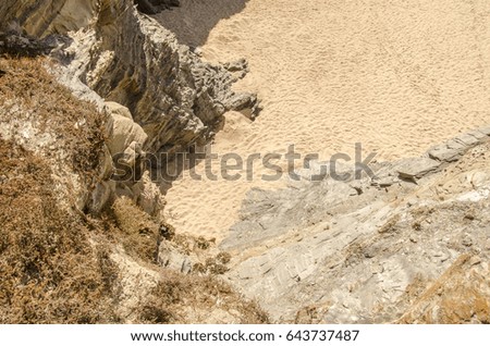 view of a desert with an harsh rock