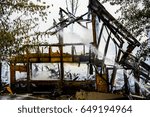 view of a deserted run down building after a fire