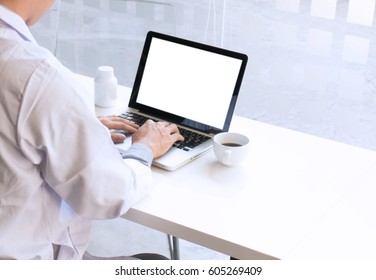 View Of Details Of Doctor Hands Typing On Keyboard With Blank Screen