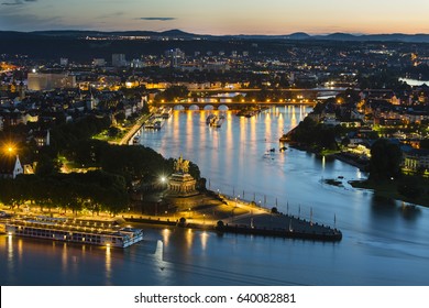 View of Deutsches Eck and the oldtown of Koblenz, Germany with  Rhine and Moselle River in the night.