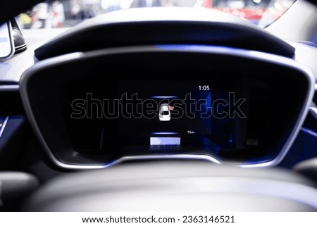 View the digital instrument cluster LED screen through your car's steering wheel.