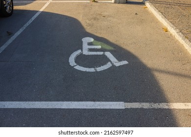 View Of Disabled Parking Spot Asphalt Marking. Sweden. 