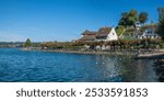 View of the docking port of Rapperswil, with the ancient Capuchin Friary and its vineyards in the background, St. Gallen