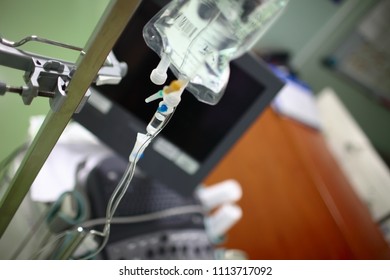 View of doctor's office with equipment and iv drip bag on the steel pole. - Shutterstock ID 1113717092