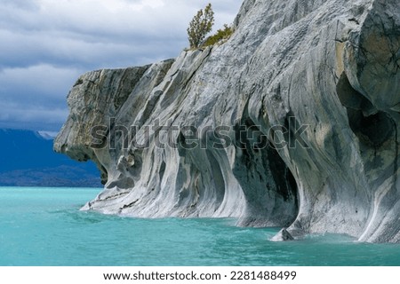 View of the Dog head profile at the Marble Caves on Lake General Carrera, Patagonia, Chile. Marble Caves are naturally sculpted caves made completely of marble and formed by the water action.