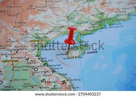 View of Dongfang, is one of the five county-level cities of Hainan province, China, on a geographical map of Asia, marked with red pushpin                           