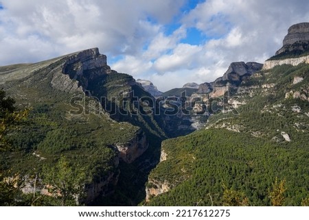 view down and along the Canon de Anisclo (Anisclo Canyon) gorge with a view of the mountains, rock outcrops and forests, Ordesa National Park in the Spanish Pyrenees