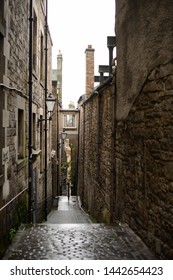A view down Anchor Close, a small cobbled alley off the Royal Mile in Edinburgh.