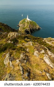 View down on South Stack light house on sunny morning. Anglesey, North Wales, United Kingdom.