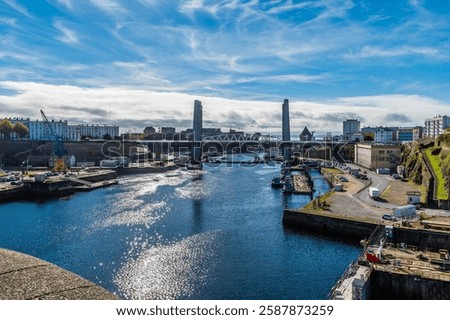 A view down the Penfield River at Brest, France on a sunny day in autumn