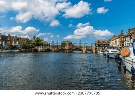 A view down the River Great Ouse at the quayside in St Ives, Cambridgeshire in summertime