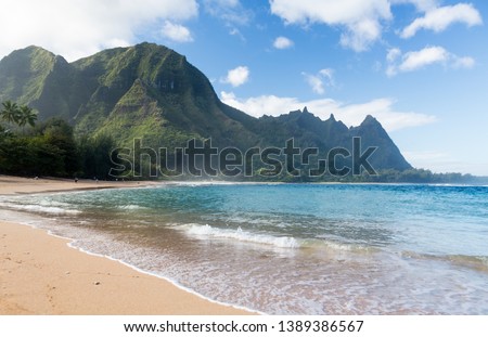 View down the sand at Tunnels Beach in winter on Hawaiian island of Kauai on North Shore
