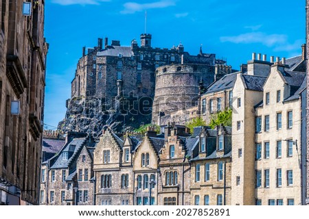A view down a street towards the castle in Edinburgh, Scotland on a summers day