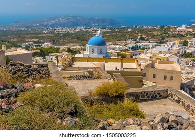 A View Down From The Top Of The Castle In Pyrgos, Santorini In Summertime