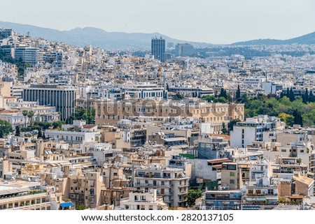 A view down towards the Hellenic Parliament building from the north side of the Acropolis citadel in Athens, Greece in early summertime