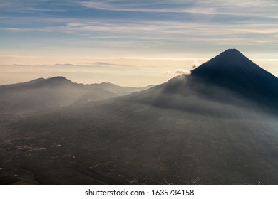 View down a valley from Acatenango volcano during sunrise