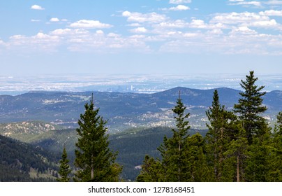 View Of Downtown Denver, Colorado City Skyline Seen From The Front Range Mountains