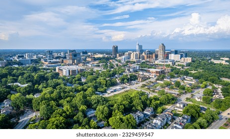 View of downtown Raleigh, North Carolina with blue sky background.