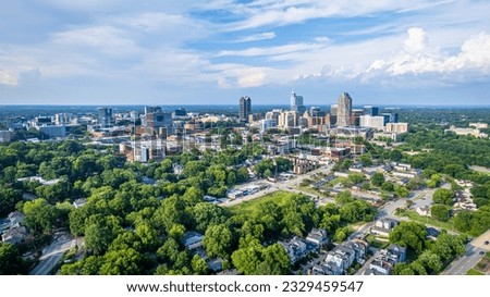 View of downtown Raleigh, North Carolina with blue sky background.