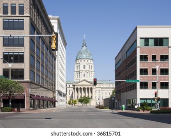 A view of downtown Topeka with the Kansas State Capitol Building visible.