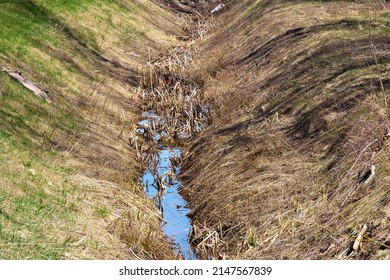 View Of The Drainage Ditch. Removal Of Excess Water From The Field.