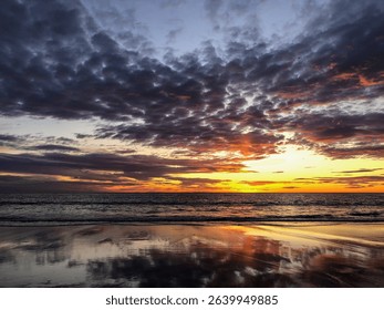 View of a dramatic sunset at the beach
