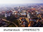 View from drone of historic center of Lublin with Old Church Square and Dominican monastery on background with Catholic Archcathedral and Trinitarian Tower at springtime, Poland