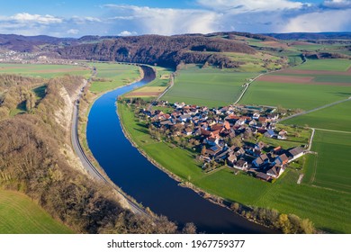 View of drone of landscape of river Weser and village Doelme  in Germany