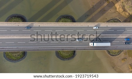 Similar – Image, Stock Photo Drone looking down on a traffic jam on the highway from above