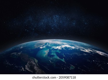  View of the Earth, star and galaxy. Sunrise over planet Earth, view from space. Concept on the theme of ecology, environment, Earth Day. Elements of this image furnished by NASA.