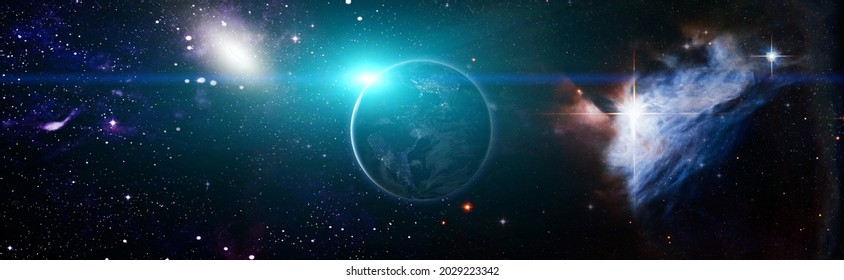 View of the Earth, sun, star and galaxy. Sunrise over planet Earth, view from space.Elements of this image are furnished by NASA - Powered by Shutterstock