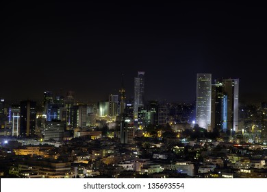 A view to the east, depicting the cityscape of downtown Tel-Aviv and its neighboring city Ramat-Gan at night. This is the central skyscraper area in the biggest metropolis in Israel.