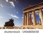 View of the eastern side of the Parthenon with tree and blue sky background, Athens, Greece