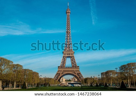 Eiffel Tower in summer on blue sky