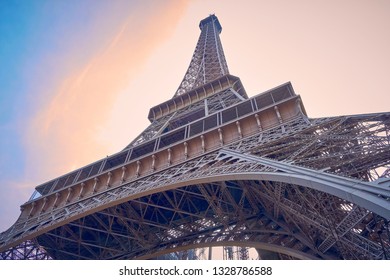 View of the Eiffel tower on a clear blue sky day. view from below the tower