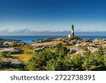 A view of the Eigeroy Lighthouse on the small island of Midbrodoya near Eigersund in southern Norway