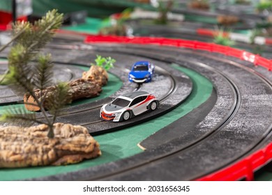 View Of Electric Slot Cars On The Toy Race Track Ready To Play