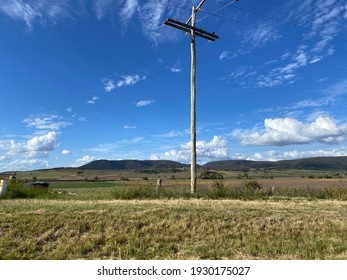 View Of Electricity Pole And Mountains In Regional Queensland, Australia