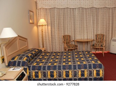 a view of an elegant bed room