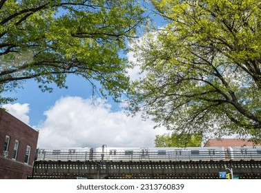 A view of an elevated train in the city 