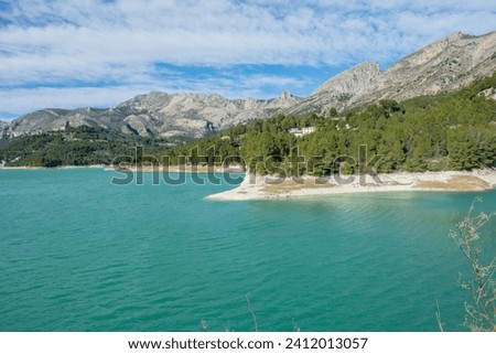 View of the Emerald Guadalest reservoir near the Spanish town of Guadalest, in the province of Alicante, Spain