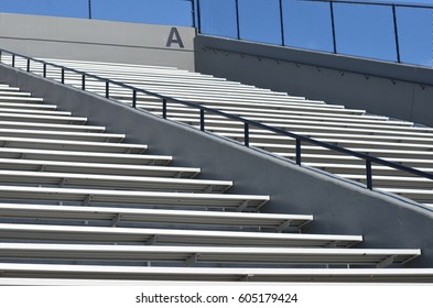 View Of Empty Bleachers In A High School Football Stadium