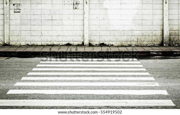 View of empty\
crosswalk, Conceptual\
photograph
