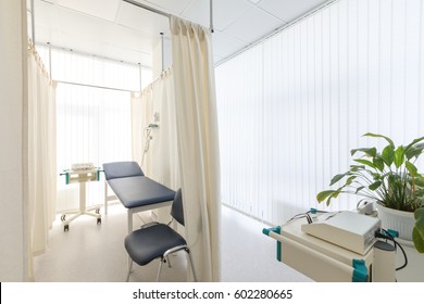 View Of Empty Doctor's Surgery. Doctor's office, blue and white interior